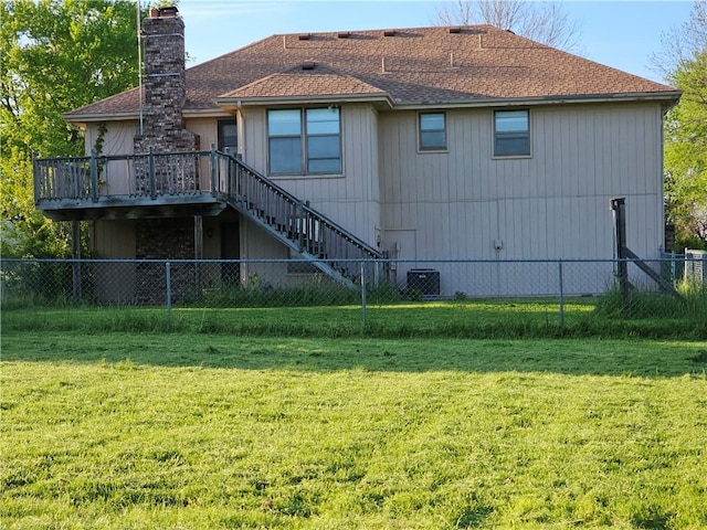 4307 211th St, Belton, MO 64012 - rear view of property with a wooden deck, stairs, a chimney, a shingled roof, and cooling unit