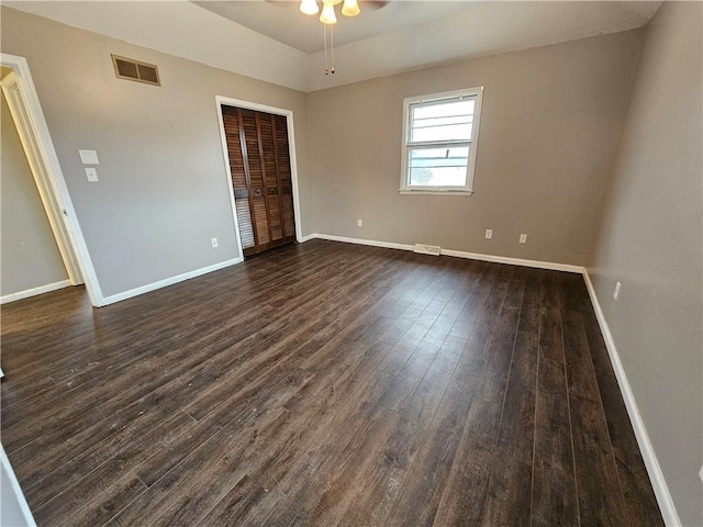 4307 211th St, Belton, MO 64012 - unfurnished bedroom featuring dark wood-style flooring, baseboards, and a closet