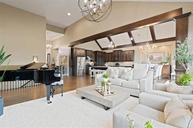 17005 Bradshaw St, Overland Park, KS 66221 - living area featuring a chandelier, high vaulted ceiling, wood finished floors, and recessed lighting