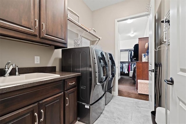 17005 Bradshaw St, Overland Park, KS 66221 - washroom featuring independent washer and dryer, cabinet space, and light colored carpet