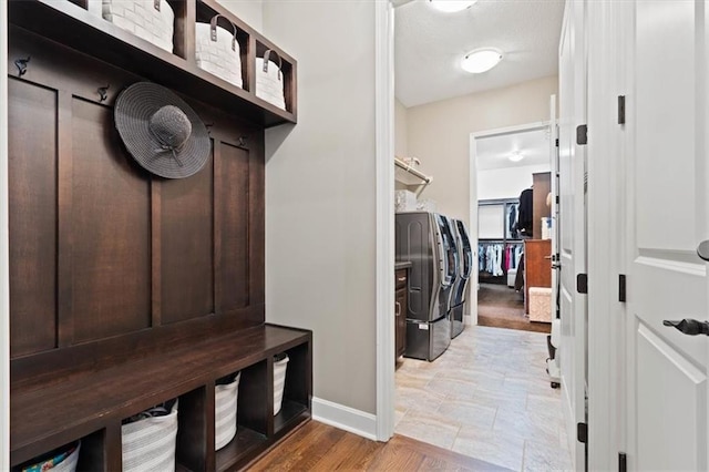 17005 Bradshaw St, Overland Park, KS 66221 - washroom with washer and dryer and baseboards