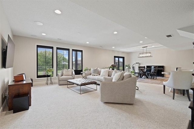 17005 Bradshaw St, Overland Park, KS 66221 - carpeted living room featuring recessed lighting and baseboards