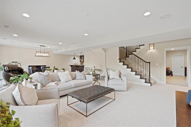 17005 Bradshaw St, Overland Park, KS 66221 - carpeted living area featuring stairway, recessed lighting, and baseboards