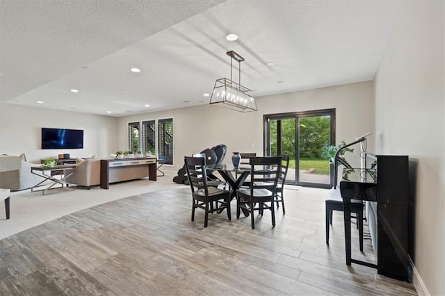 17005 Bradshaw St, Overland Park, KS 66221 - dining space with wood finished floors and recessed lighting