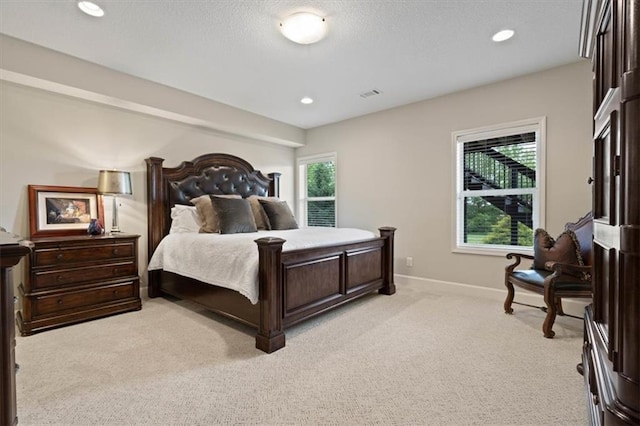 17005 Bradshaw St, Overland Park, KS 66221 - bedroom featuring light carpet, baseboards, and recessed lighting
