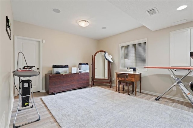 17005 Bradshaw St, Overland Park, KS 66221 - bedroom featuring light wood finished floors and baseboards
