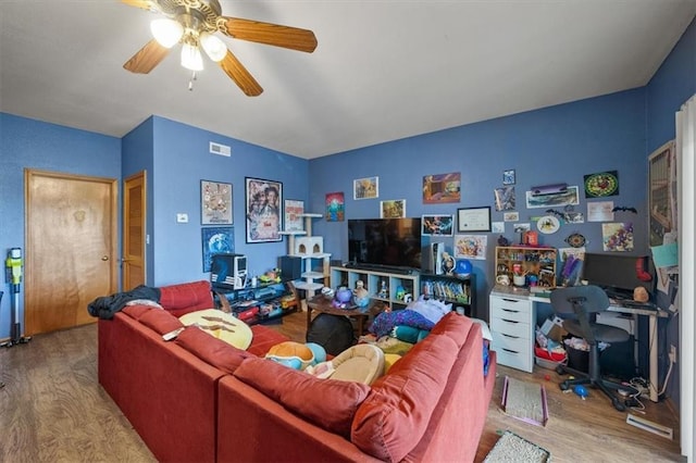 425 Thornton St, Leavenworth, KS 66048 - living room with wood finished floors, ceiling fan, and an office area