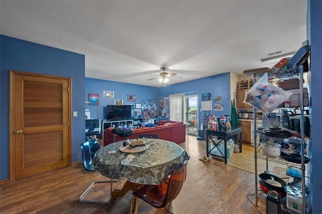 425 Thornton St, Leavenworth, KS 66048 - dining area featuring wood finished floors and a ceiling fan