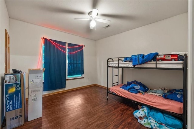 425 Thornton St, Leavenworth, KS 66048 - bedroom featuring wood finished floors, ceiling fan, and baseboards