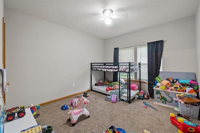 425 Thornton St, Leavenworth, KS 66048 - unfurnished bedroom featuring carpet floors, baseboards, and a ceiling fan