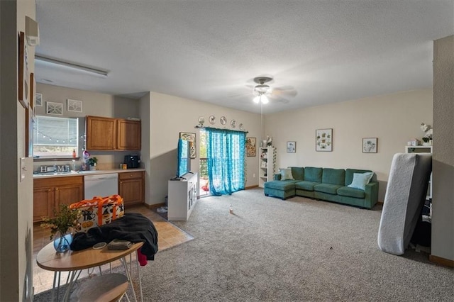 425 Thornton St, Leavenworth, KS 66048 - living area with light colored carpet, ceiling fan, and a textured ceiling