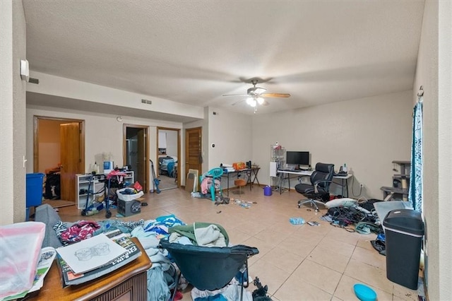 425 Thornton St, Leavenworth, KS 66048 - rec room with a desk, tile patterned flooring, and ceiling fan