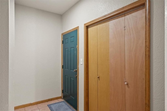 425 Thornton St, Leavenworth, KS 66048 - entryway with light tile patterned flooring and baseboards
