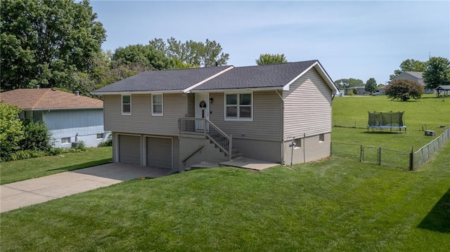 211 Carla St, Excelsior Springs, MO 64024 - ranch-style home with a garage, driveway, a trampoline, and cooling unit