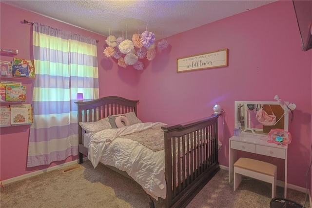 211 Carla St, Excelsior Springs, MO 64024 - bedroom with carpet floors, a textured ceiling, and baseboards