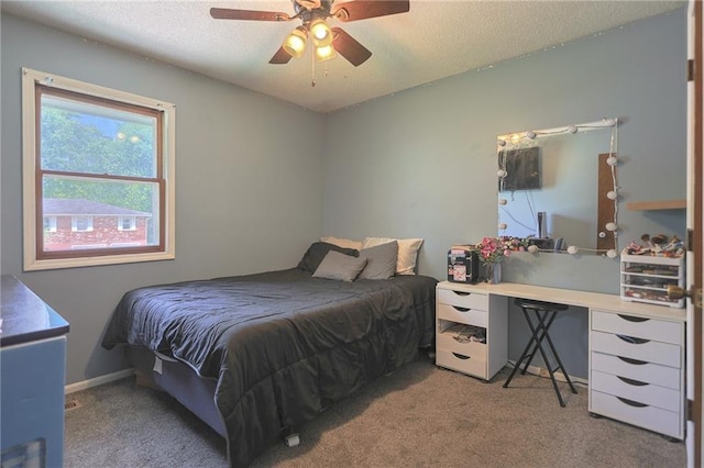 211 Carla St, Excelsior Springs, MO 64024 - bedroom featuring carpet, a textured ceiling, and ceiling fan