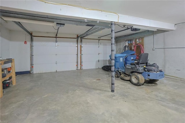 211 Carla St, Excelsior Springs, MO 64024 - garage with a garage door opener