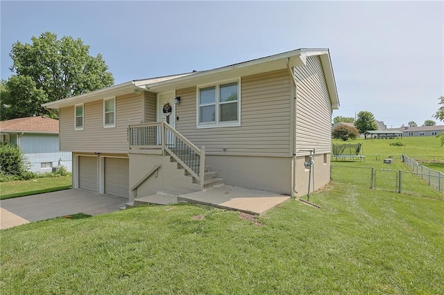 211 Carla St, Excelsior Springs, MO 64024 - view of front of home featuring a garage and driveway