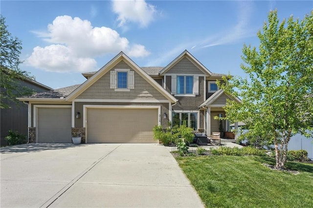 3716 NW 76th St, Kansas City, MO 64151 - craftsman-style house featuring concrete driveway, a front lawn, an attached garage, and stone siding