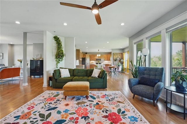 3716 NW 76th St, Kansas City, MO 64151 - living room featuring light wood-style floors, recessed lighting, and ceiling fan