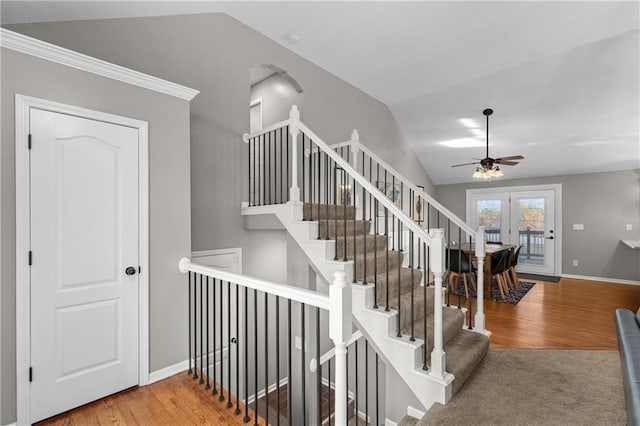 957 NW Dogwood Dr, Grain Valley, MO 64029 - stairway with wood finished floors, ceiling fan, lofted ceiling, and baseboards