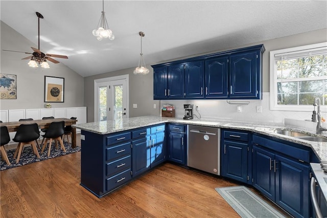 957 NW Dogwood Dr, Grain Valley, MO 64029 - kitchen featuring blue cabinetry, stainless steel dishwasher, a sink, a peninsula, and wood finished floors