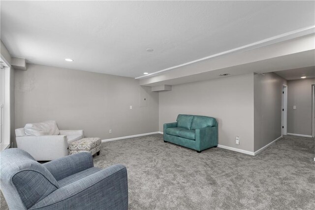 957 NW Dogwood Dr, Grain Valley, MO 64029 - living area with carpet floors, baseboards, and recessed lighting