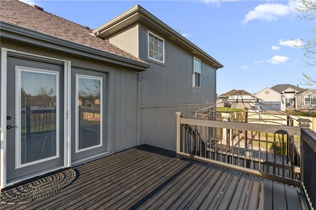 957 NW Dogwood Dr, Grain Valley, MO 64029 - wooden deck featuring a residential view