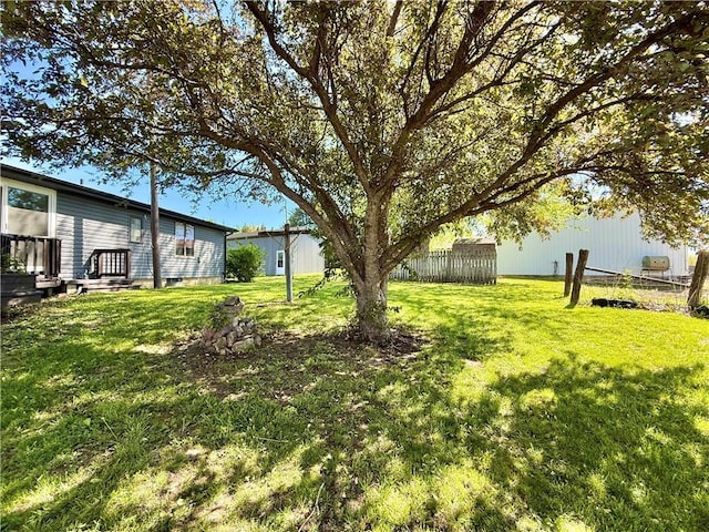 view of yard with fence