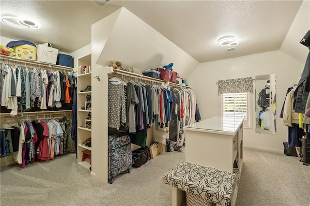 10360 Magnolia Ln, Parkville, MO 64152 - spacious closet featuring carpet floors and lofted ceiling