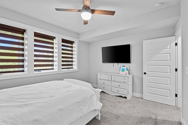 22622 W 87th Ter, Lenexa, KS 66227 - carpeted bedroom with baseboards and a ceiling fan