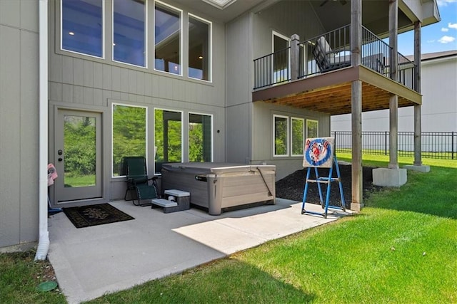 22622 W 87th Ter, Lenexa, KS 66227 - rear view of house with a hot tub, a balcony, and a patio area