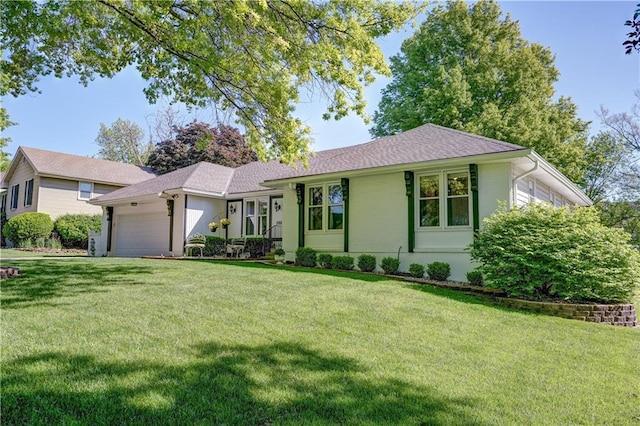 single story home with a front lawn, roof with shingles, and a garage