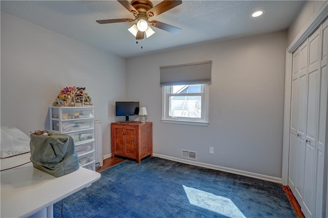 bedroom with a closet, visible vents, recessed lighting, carpet flooring, and baseboards