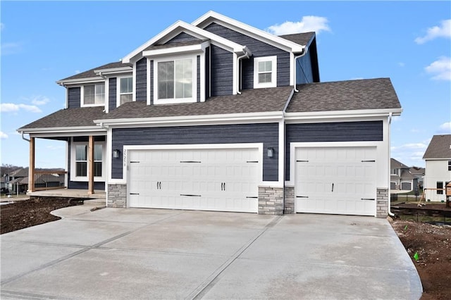 25256 W 149th Ter, Olathe, KS 66061 - view of front facade featuring stone siding, a porch, driveway, and roof with shingles