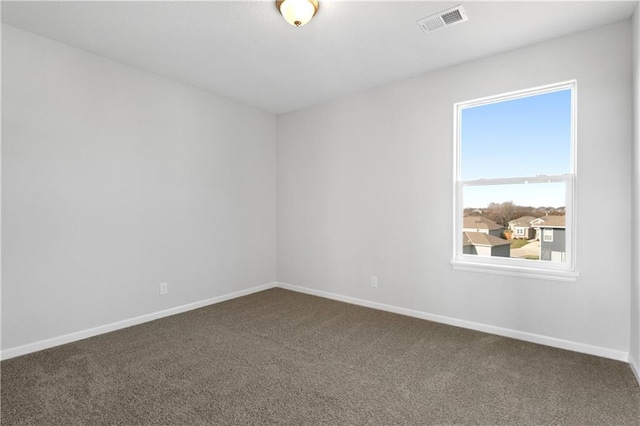 25256 W 149th Ter, Olathe, KS 66061 - carpeted empty room with baseboards and visible vents