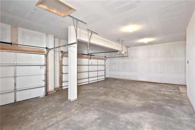 25256 W 149th Ter, Olathe, KS 66061 - garage featuring baseboards and a garage door opener