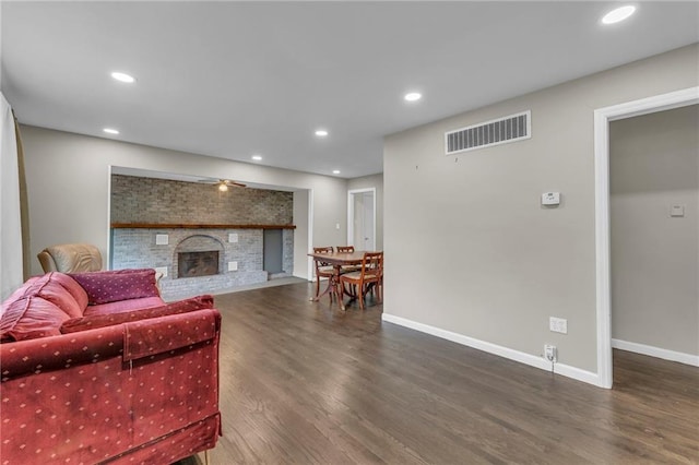 1400 NE 67th Ter, Gladstone, MO 64118 - living room with wood finished floors, a fireplace, baseboards, and recessed lighting