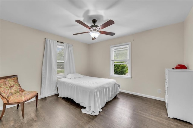 1400 NE 67th Ter, Gladstone, MO 64118 - bedroom featuring dark wood-style floors, baseboards, and a ceiling fan