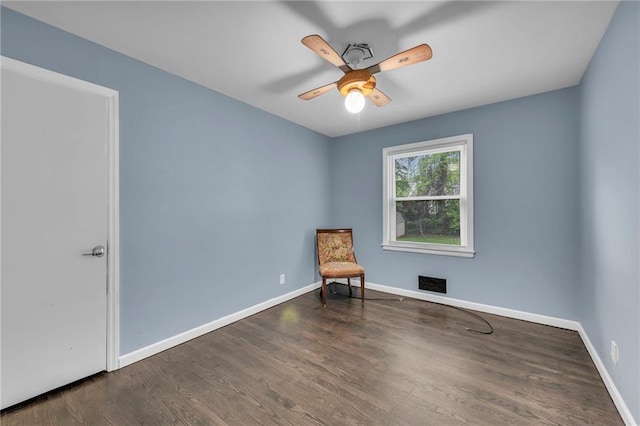 1400 NE 67th Ter, Gladstone, MO 64118 - unfurnished room with ceiling fan, wood finished floors, and baseboards