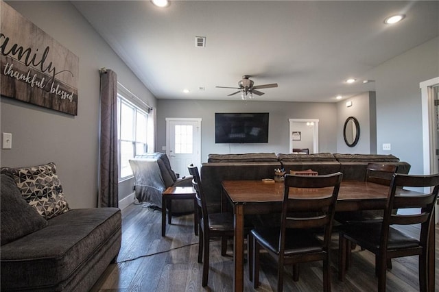 dining area featuring dark wood-type flooring, visible vents, recessed lighting, ceiling fan, and baseboards