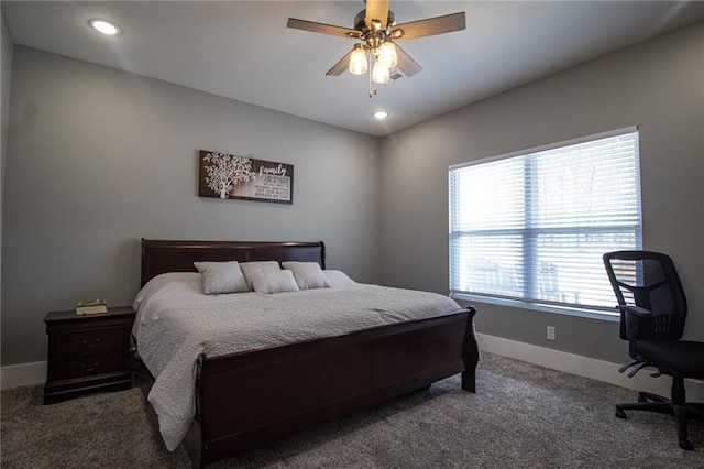 carpeted bedroom featuring baseboards, ceiling fan, and recessed lighting
