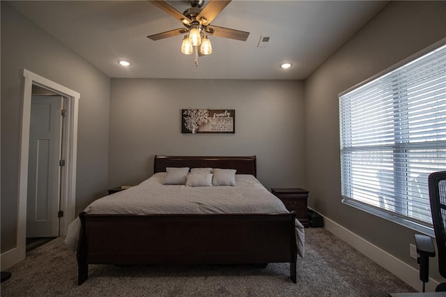 carpeted bedroom with a ceiling fan, recessed lighting, baseboards, and visible vents