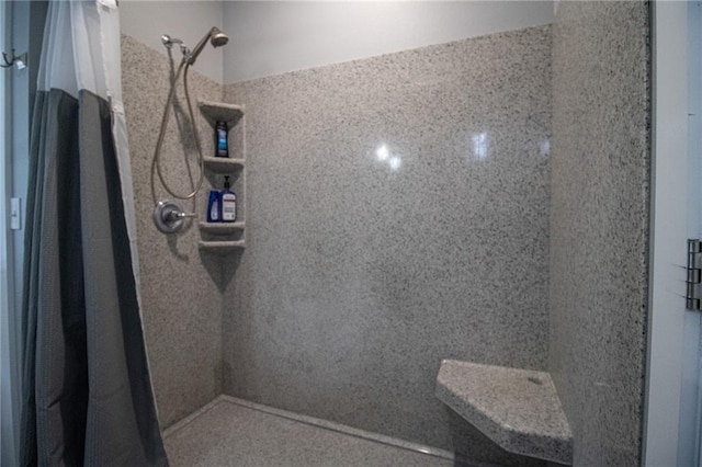bathroom with curtained shower