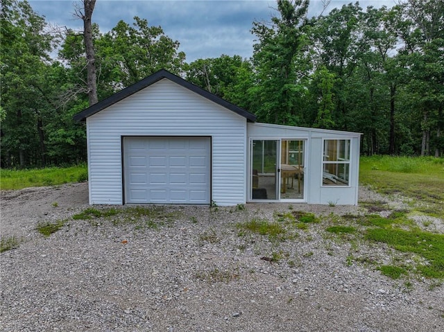 3813 Mt Horeb Rd, Camdenton, MO 65020 - detached garage featuring gravel driveway