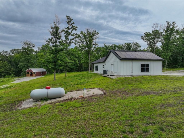 3813 Mt Horeb Rd, Camdenton, MO 65020 - view of green lawn featuring an outdoor structure and central AC unit