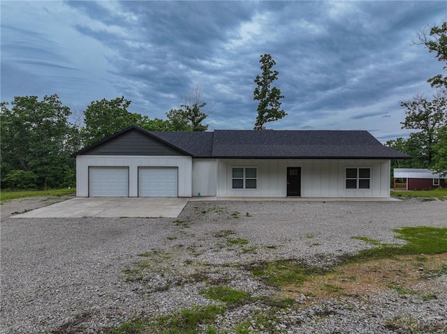 3813 Mt Horeb Rd, Camdenton, MO 65020 - ranch-style house featuring a garage, driveway, a porch, and a shingled roof