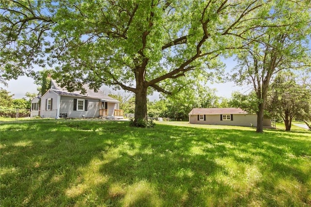 5801 E 56th St, Kansas City, MO 64129 - view of green lawn