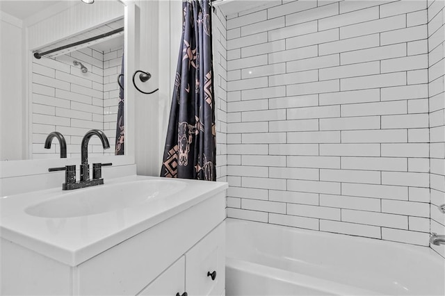 5801 E 56th St, Kansas City, MO 64129 - bathroom featuring vanity and shower / bath combo