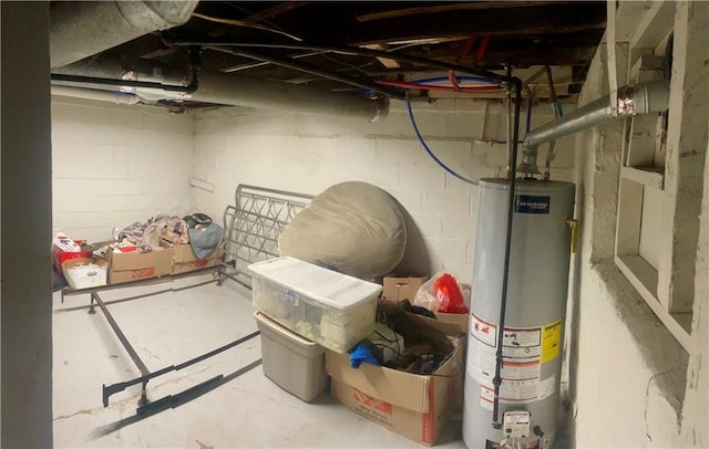 5801 E 56th St, Kansas City, MO 64129 - unfinished basement with water heater